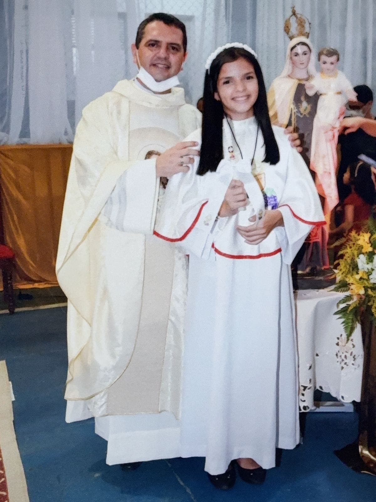 Maria Letícia na Primeira Eucaristia